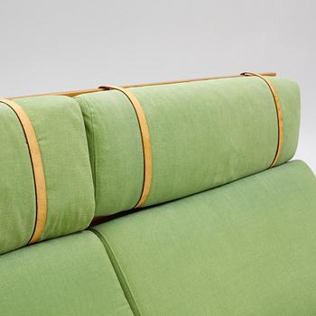 A sofa with a stool, Erik Jørgensen Møbelfabrik, Denmark.