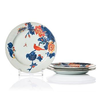 1210. A set of four imari verte dishes with parrots, Qing dynasty, 18th Century.