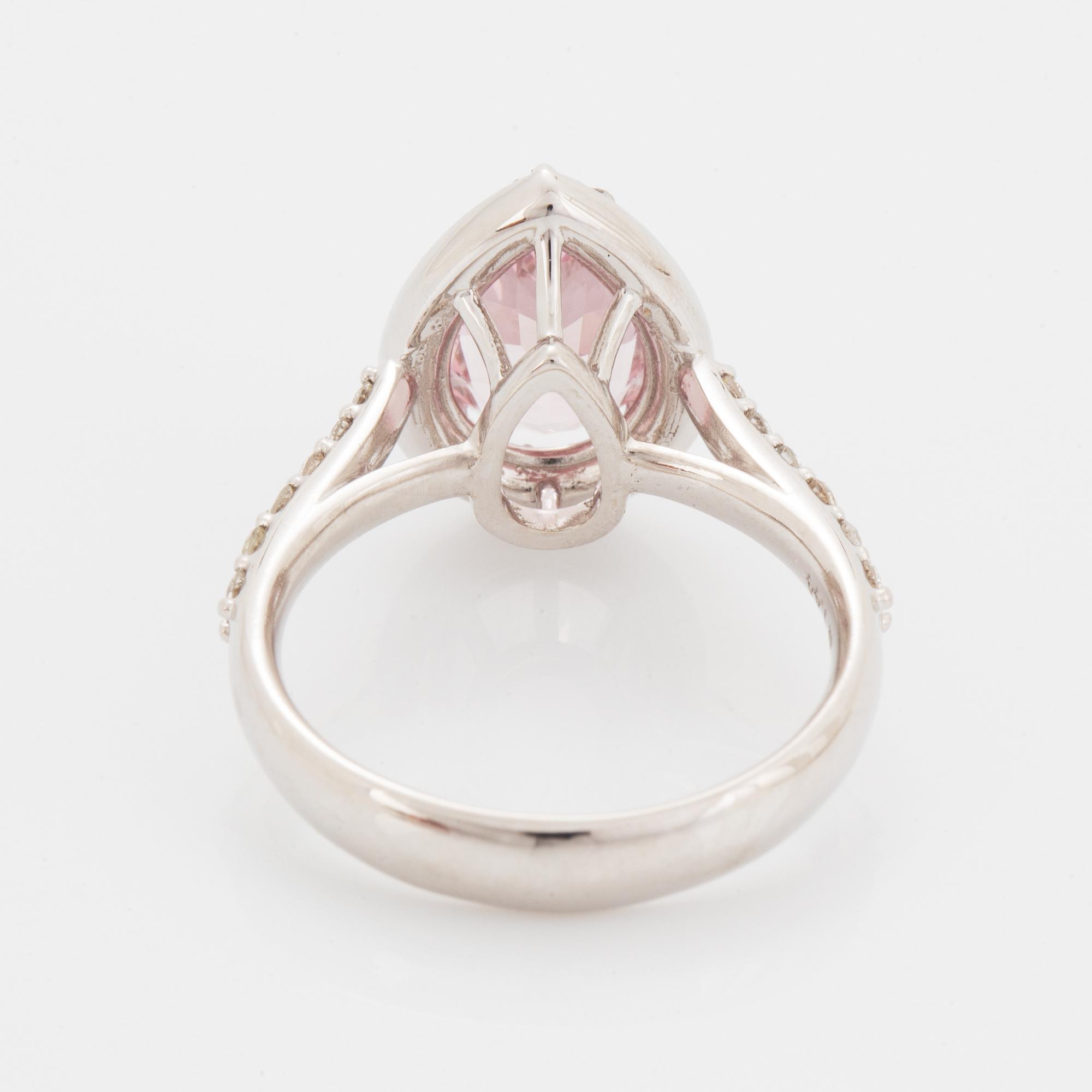 An 18K gold ring set with a faceted morganite.