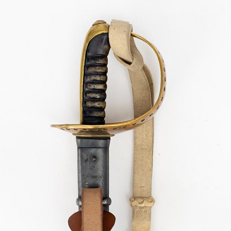 A Swedish 1893 pattern cavalry sabre, with scabbard.