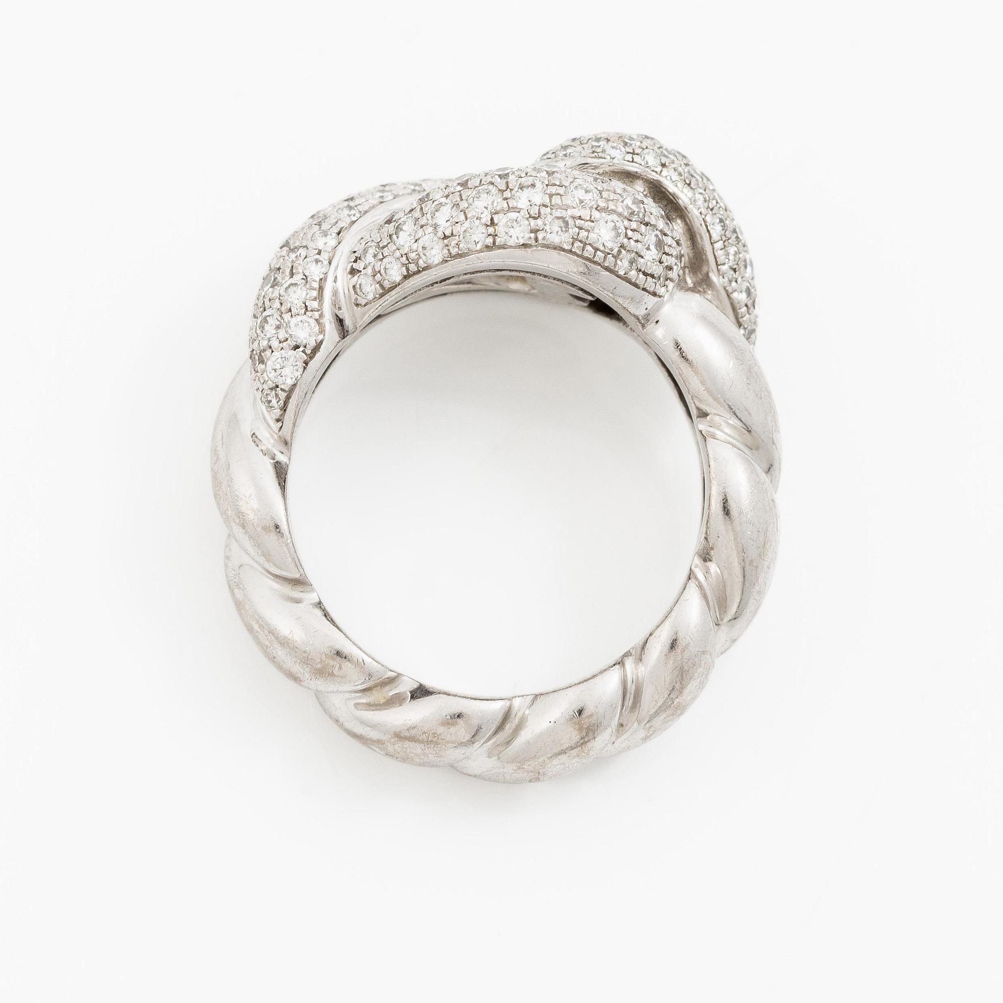 Hermès ring 18K vitguld med runda briljantslipade diamanter.