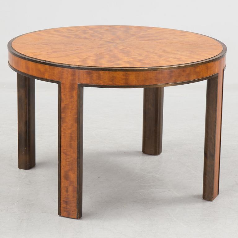 A para wood and birch coffee table from Nordiska Kompaniet, 1937.