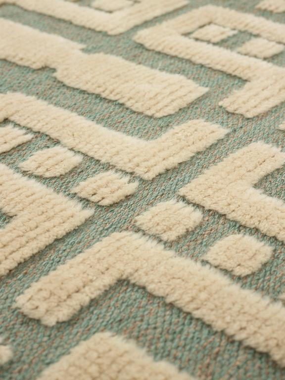 Sigvard Bernadotte, A CARPET, knotted pile in relief, ca 178 x 112 cm, signed SB (Sigvard Bernadotte).