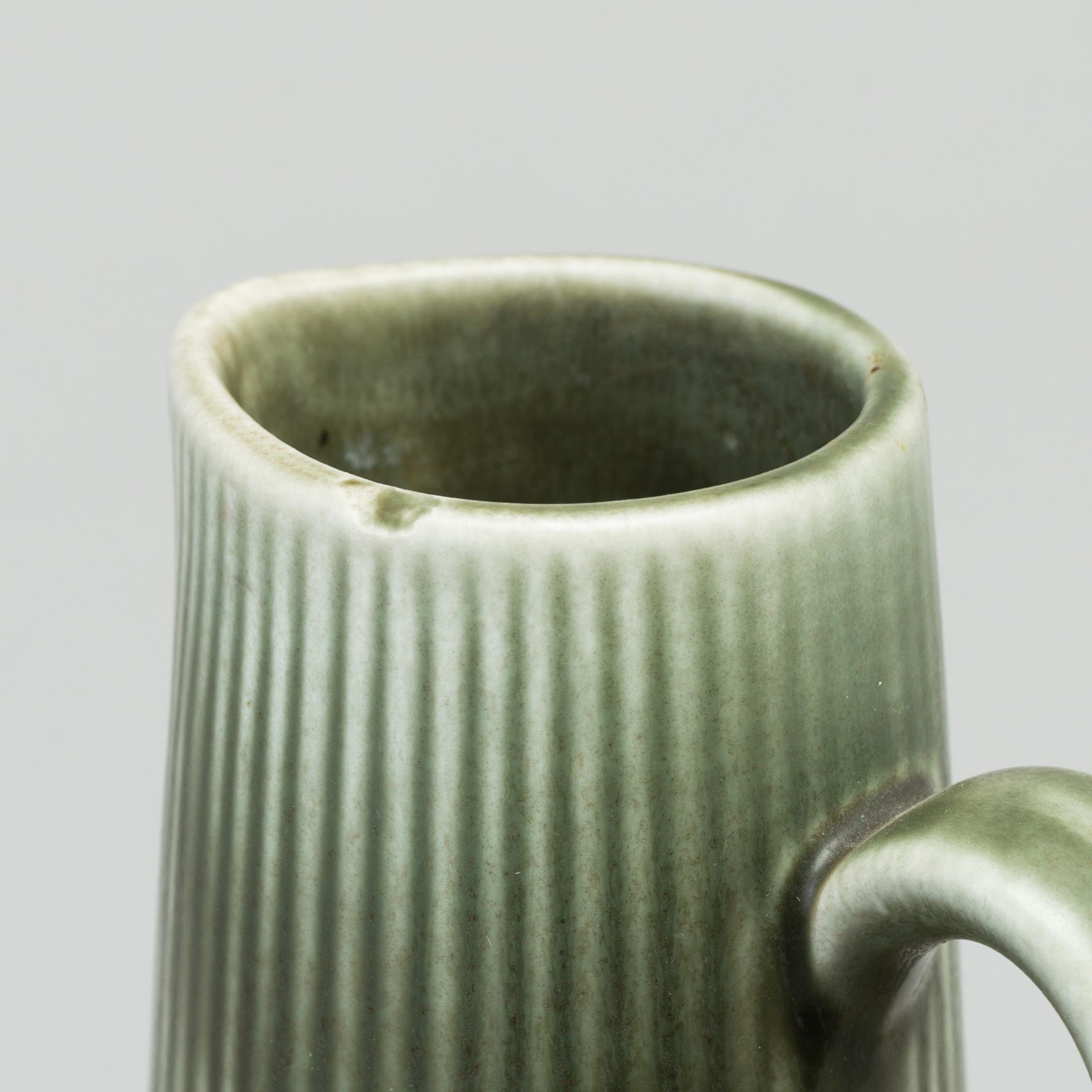 GUNNAR NYLUND, two stoneware vases  and two bowls from Rörstrand.