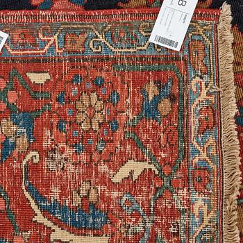 A CARPET, an antique Heriz, a so called Serapi, ca 371 x 282,5 cm.