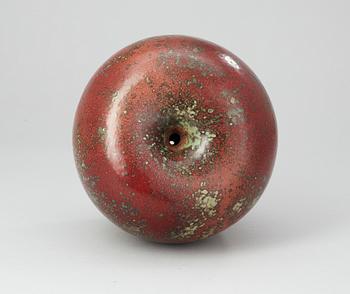 A Hans Hedberg faience apple, Biot, France.