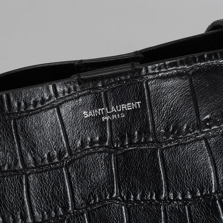 YVES SAINT LAURENT, a black patent leather shopper.