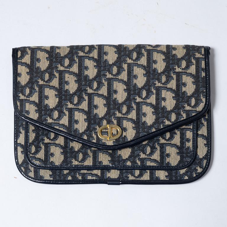 Christian Dior, a clutch and a scarf.