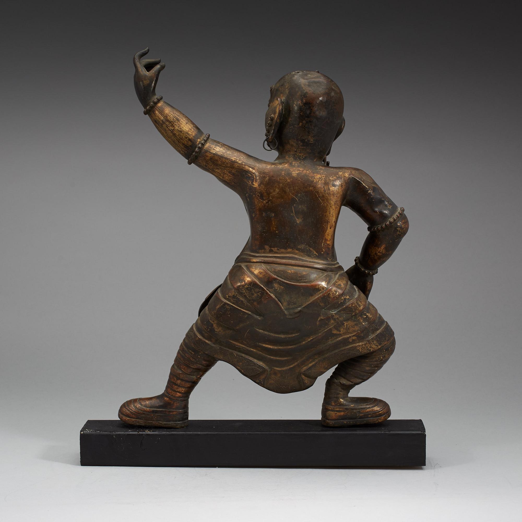 STÅENDE GUDOM, förgylld kopparlegering. 1700-tal, troligen Mongoliet.