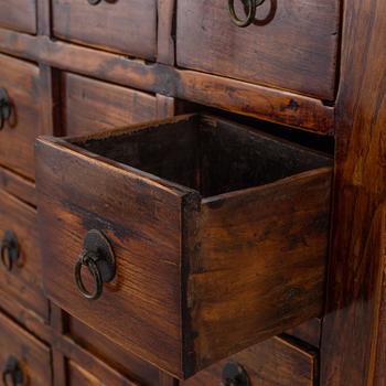 A 19th century Chinese chest of drawers/medicine cabinet.