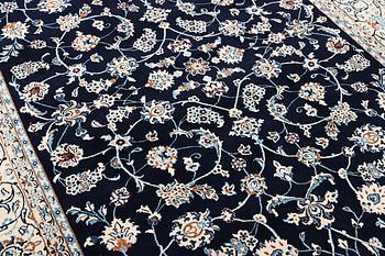 A part silk Nain rug, 9LA, c. 302 x 198 cm.