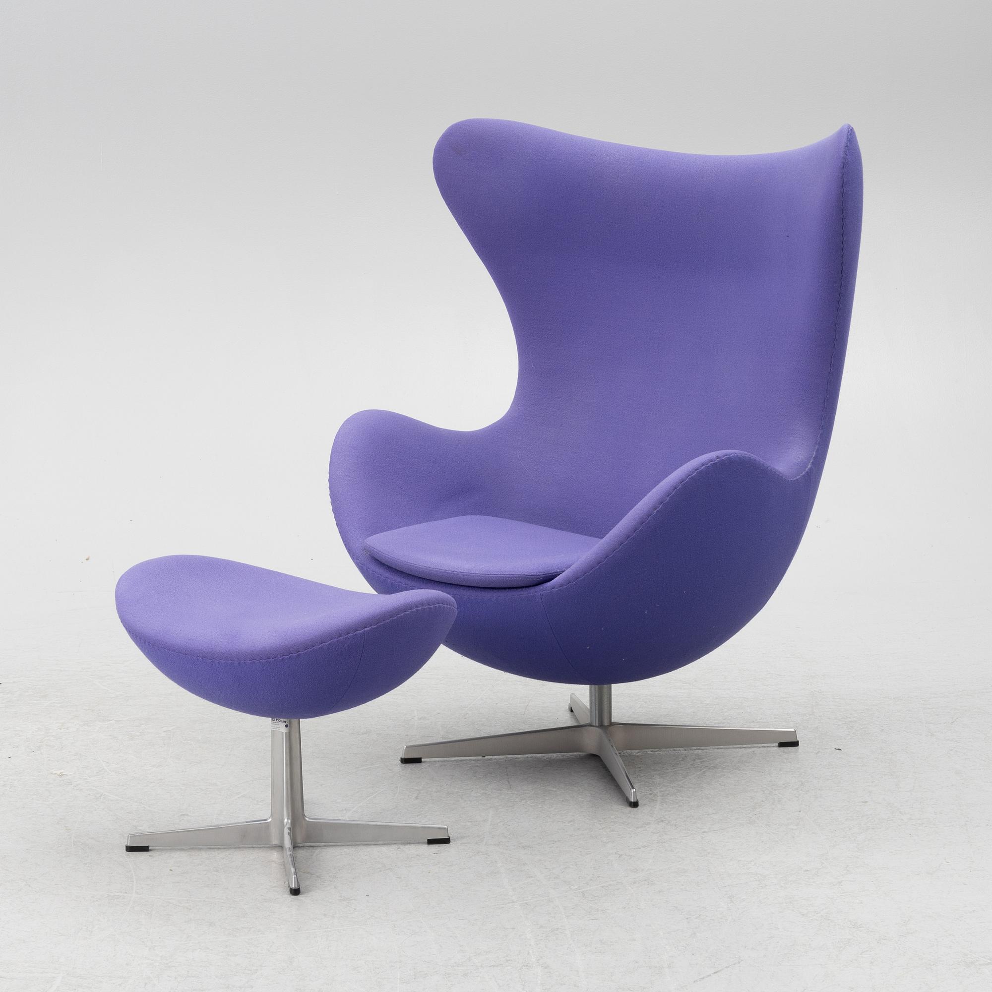 Arne Jacobsen, an armchair with footstool, "The Egg", Fritz Hansen, Denmark, 2003.