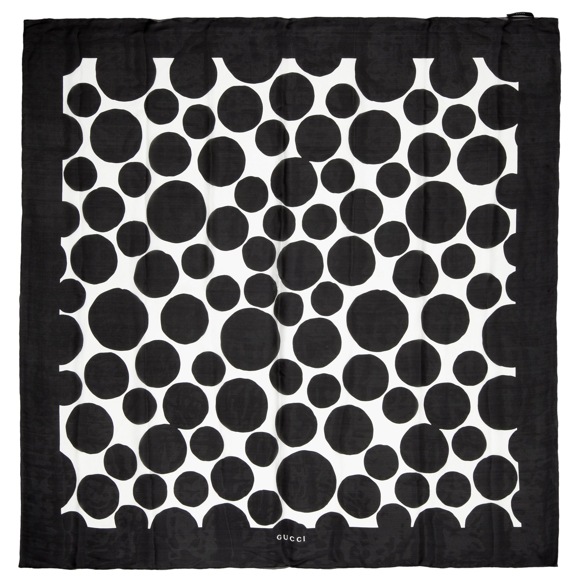 GUCCI, a black and white scarf.
