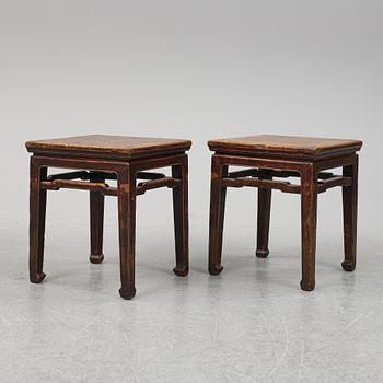 A pair of hardwood tables, 20th century.