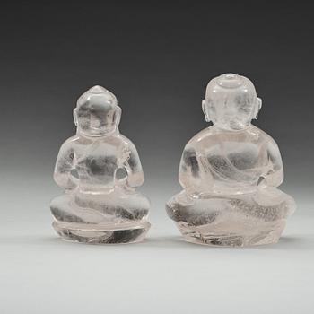 Two chinese rock chrystal figures of a seated buddha, circa 1900.