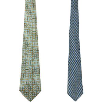 465. A set of two silk ties by Hermès.