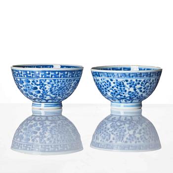 A pair of blue and white bowls, Qing dynasty with Yongzheng mark and of the period (1723-35).