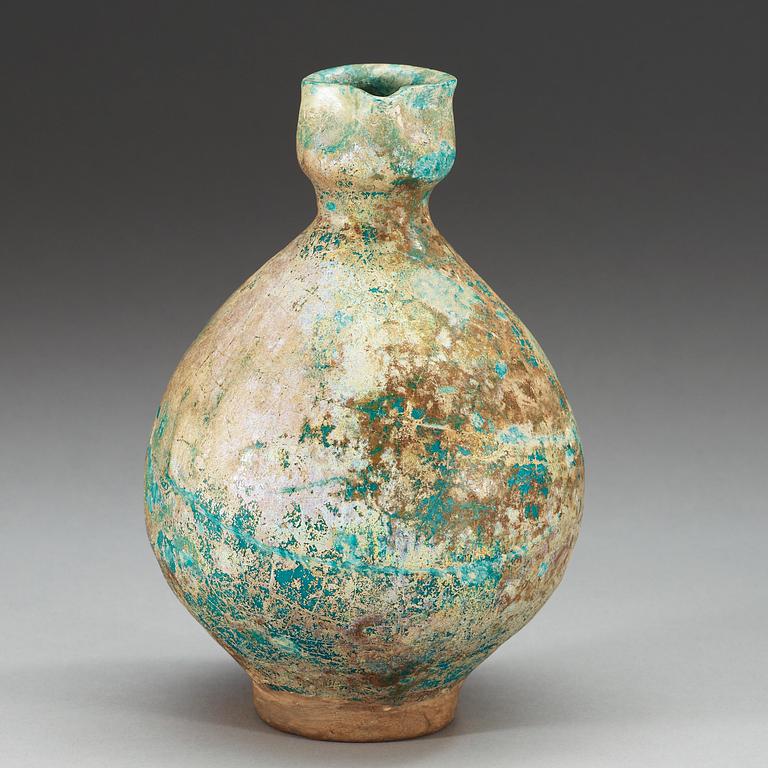 EWER, pottery. Turquoise glaze. Persia 13th century, probably Kashan.