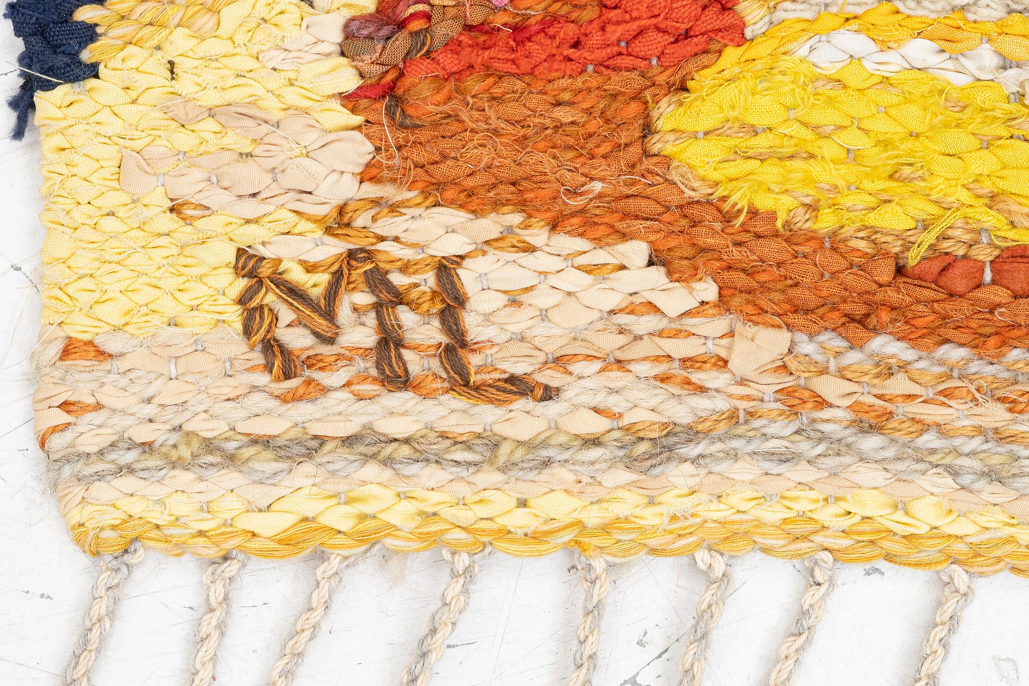 Maj Larsson, a wall hanging, rag rug, signed ML, c. 135 x 90 cm.