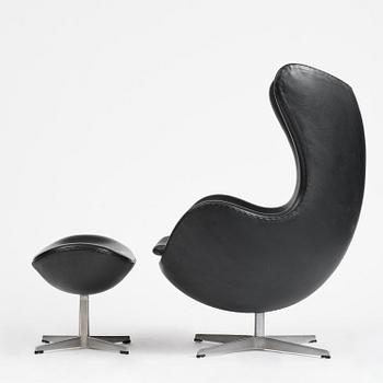 Arne Jacobsen, an "Egg" chair with ottoman, Fritz Hansen, Denmark, 2001.