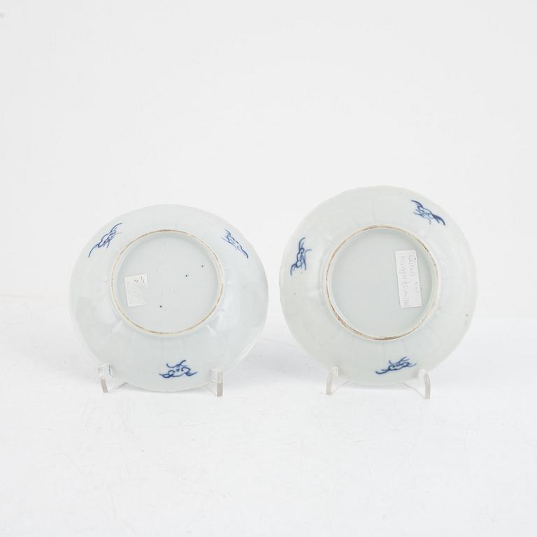 Two Chinese blue and white porcelain cups with saucers, Qing dynasty, Kangxi (1662-1722).