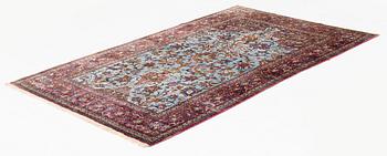 An antique silk Kashan, rug, ca 198,5 x 129,5 cm.