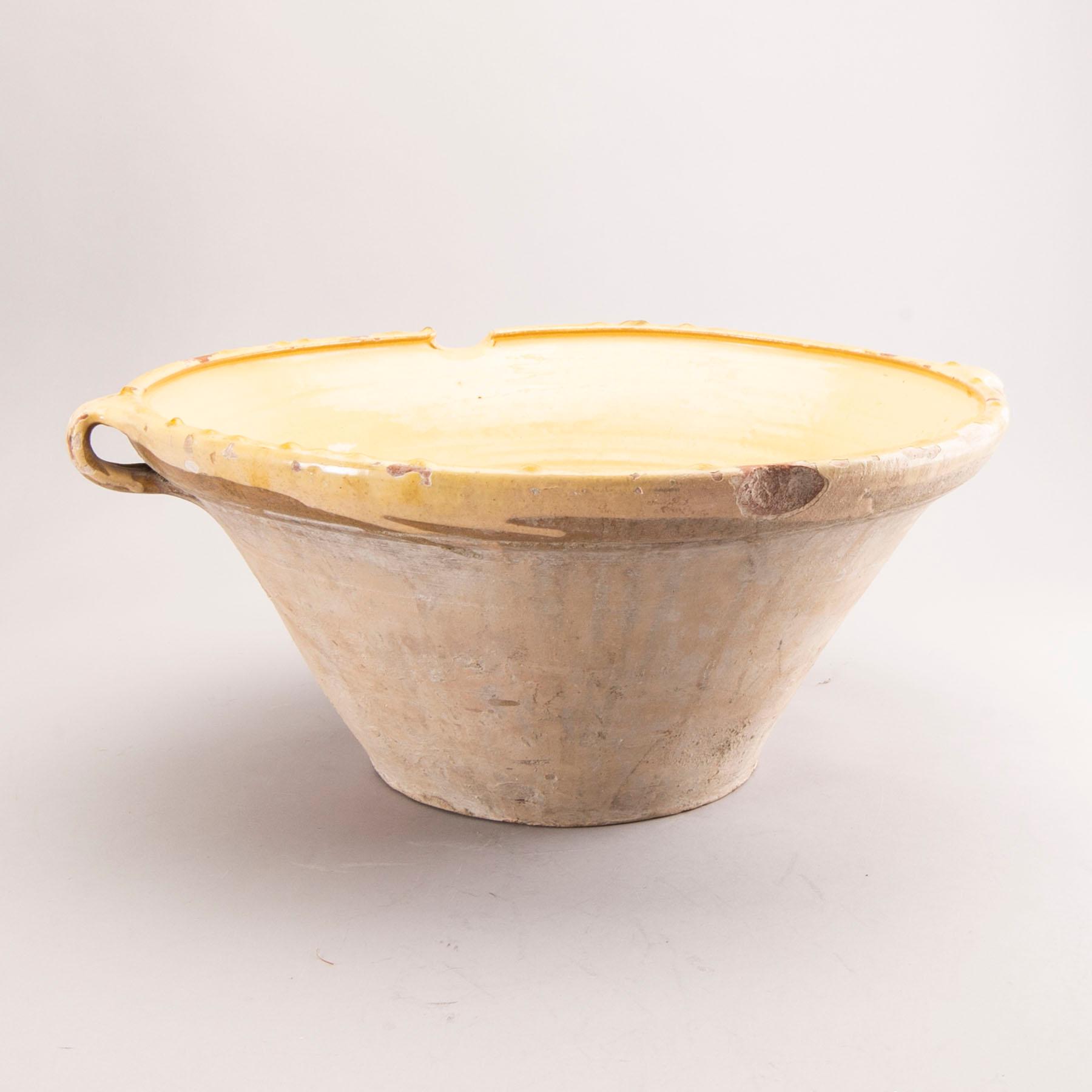 A French bowl, glazed earthenware, around 1900.