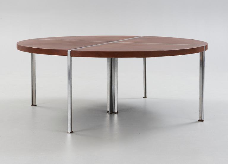 A Walter Knoll dining table with brown leather top, Germany.