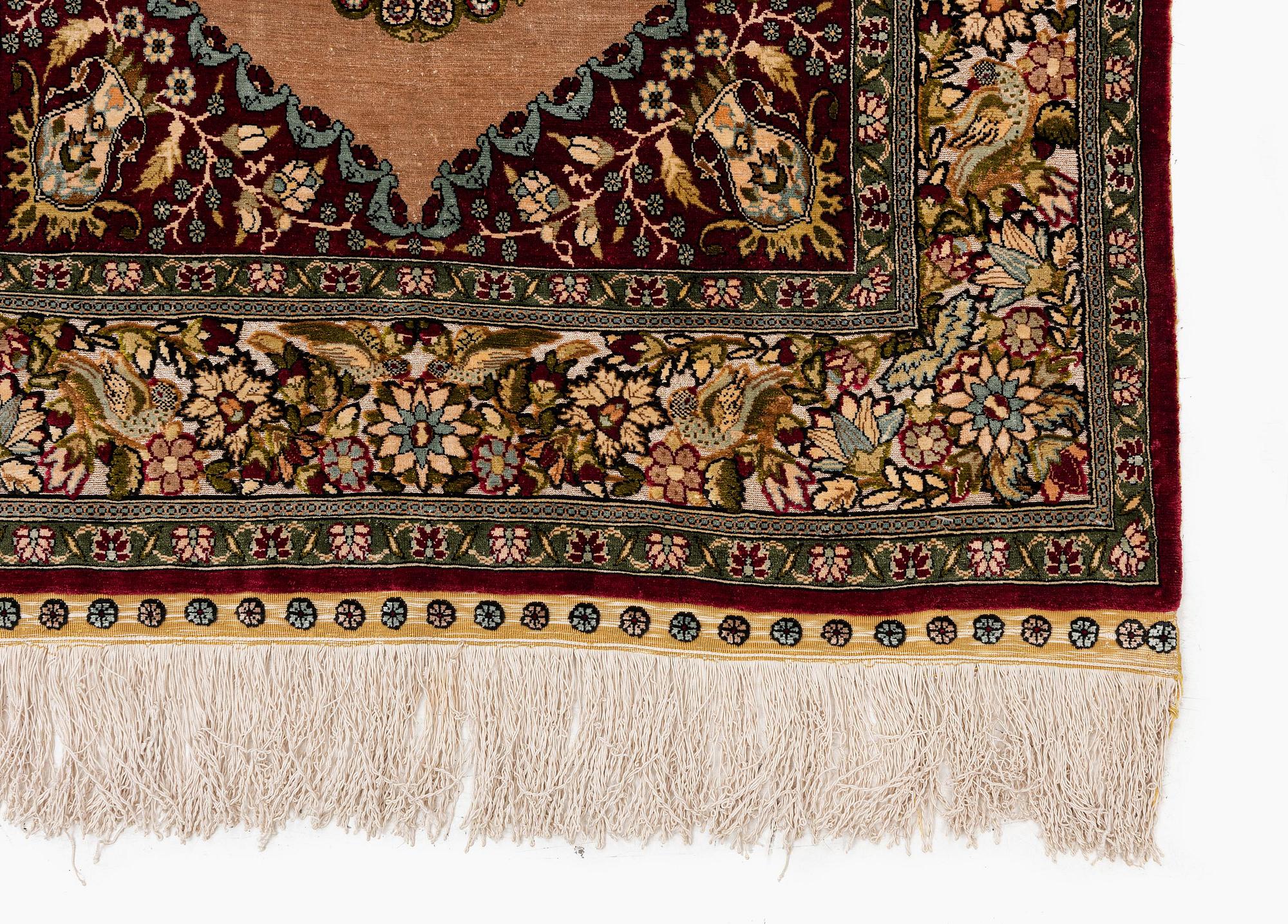 A semi-antique Hereke souf, silk and metal thread rug, West Anatolia, c. 121 x 75 cm.