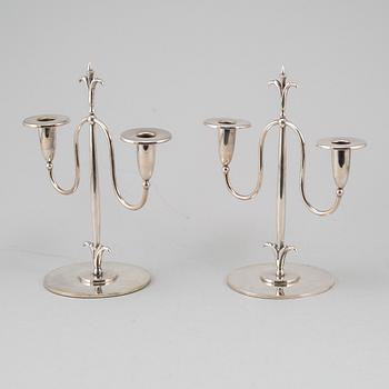 a pair of Elis Bergh silver plated candelabras, Swedish grace, CG Hallberg, Stockholm, 1920s.