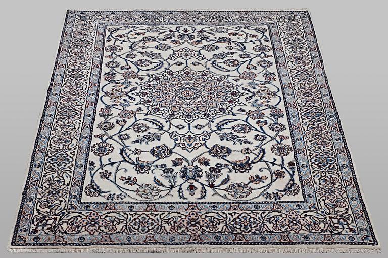 A carpet, Nain, part silk, 9 laa, ca 290 x 196 cm.
