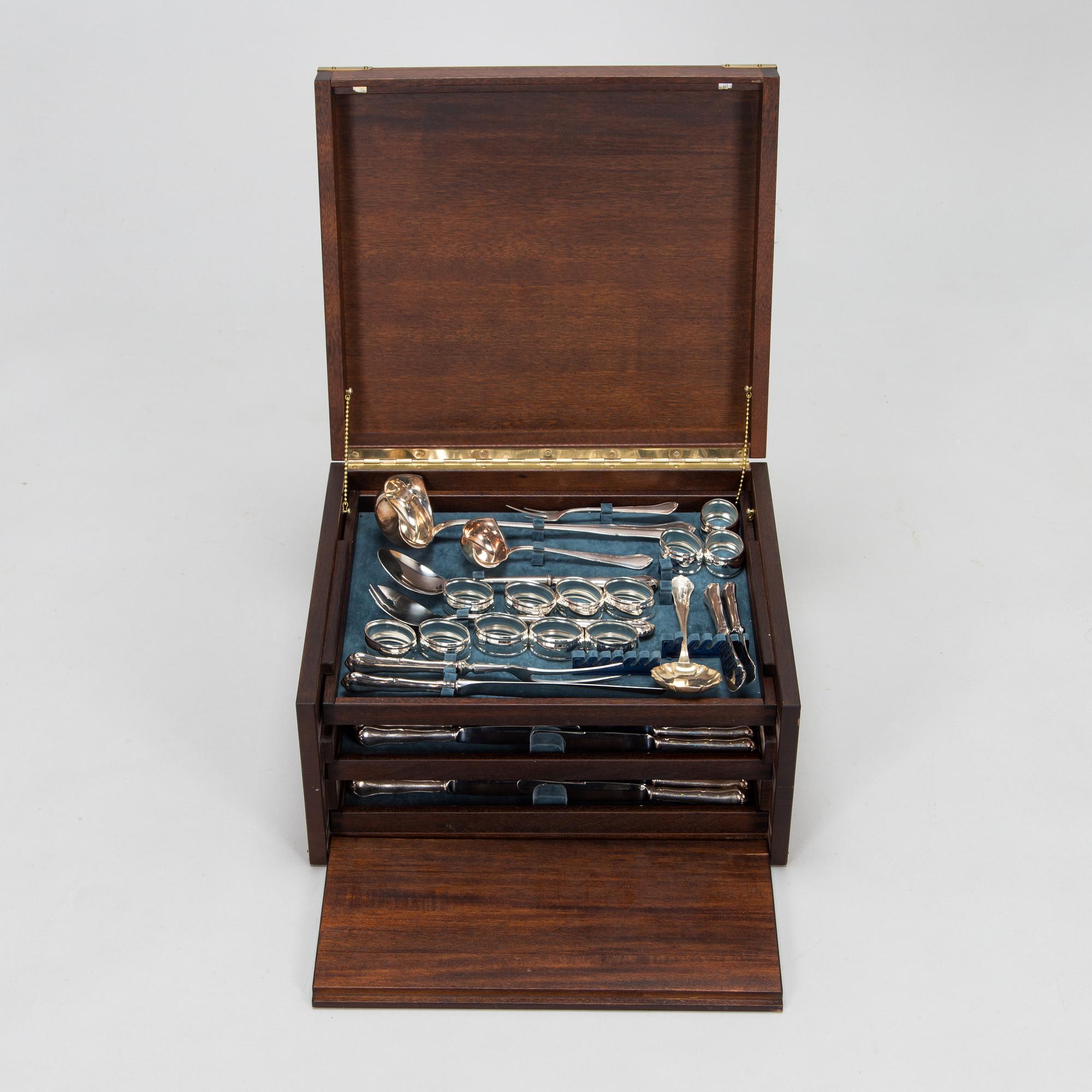 An 82-piece 'Chippendale' silver cutlery set for 12, in cutlery box, Auran Kultaseppä oy, Turku, Finland 1986-87.