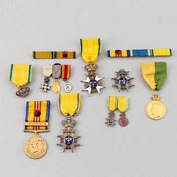 A set of medals and decorations, partly gold.