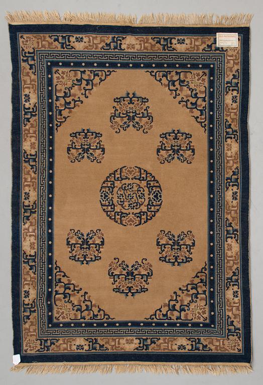 A Chinese carpet, ca 244 x 168 cm.