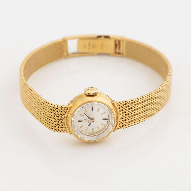 Omega 18K gold ladies watch.