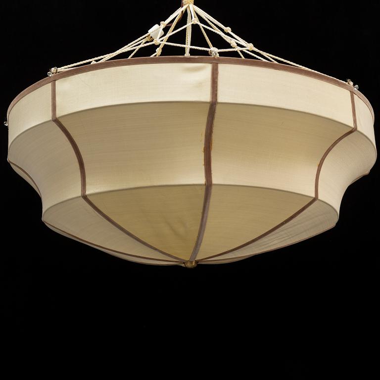 A pair of textile clad ceiling lights, 20th century.