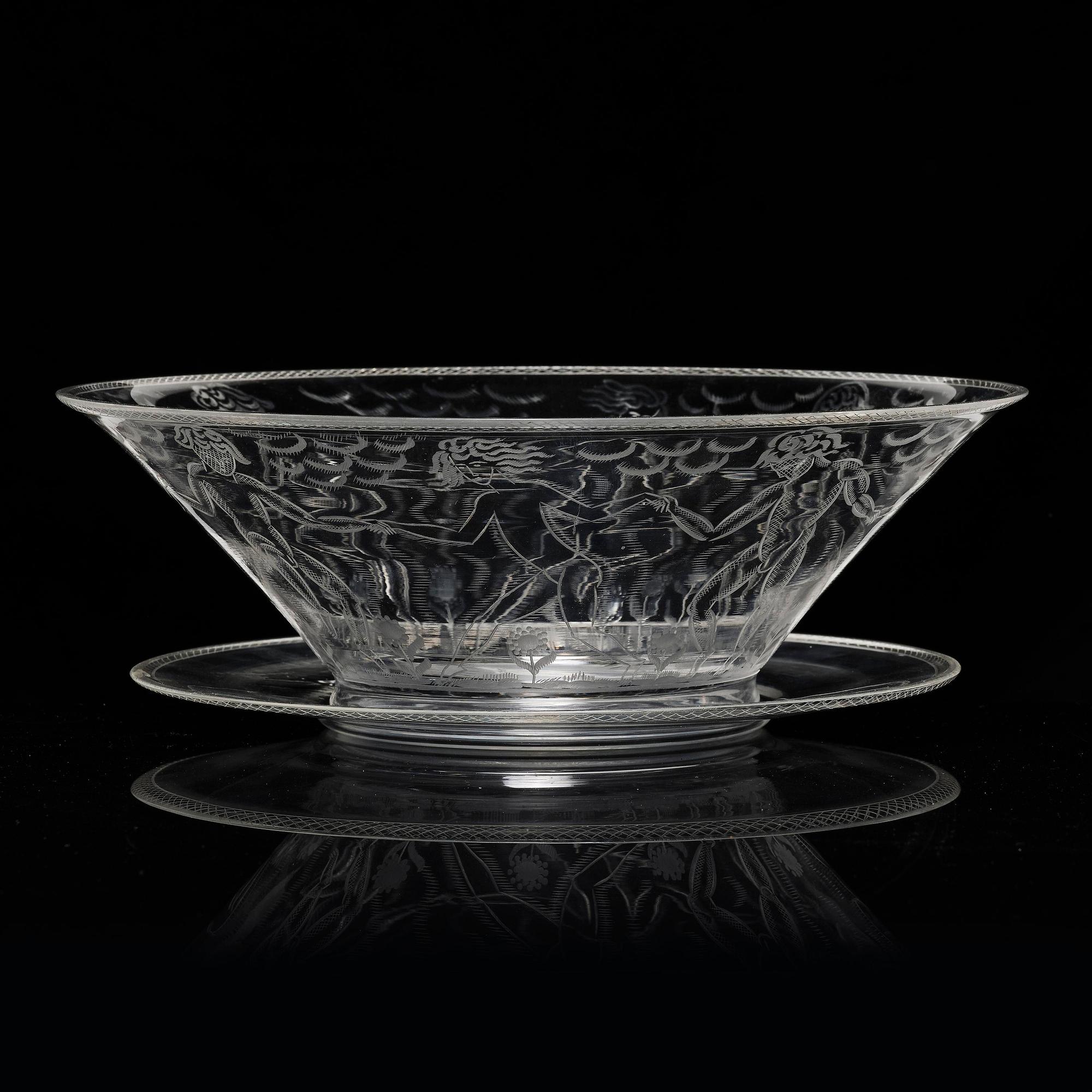 Edward Hald, an engraved glass bowl with plate, Orrefors, Sweden, 1926, model 305, engraved by Emil Goldmann.