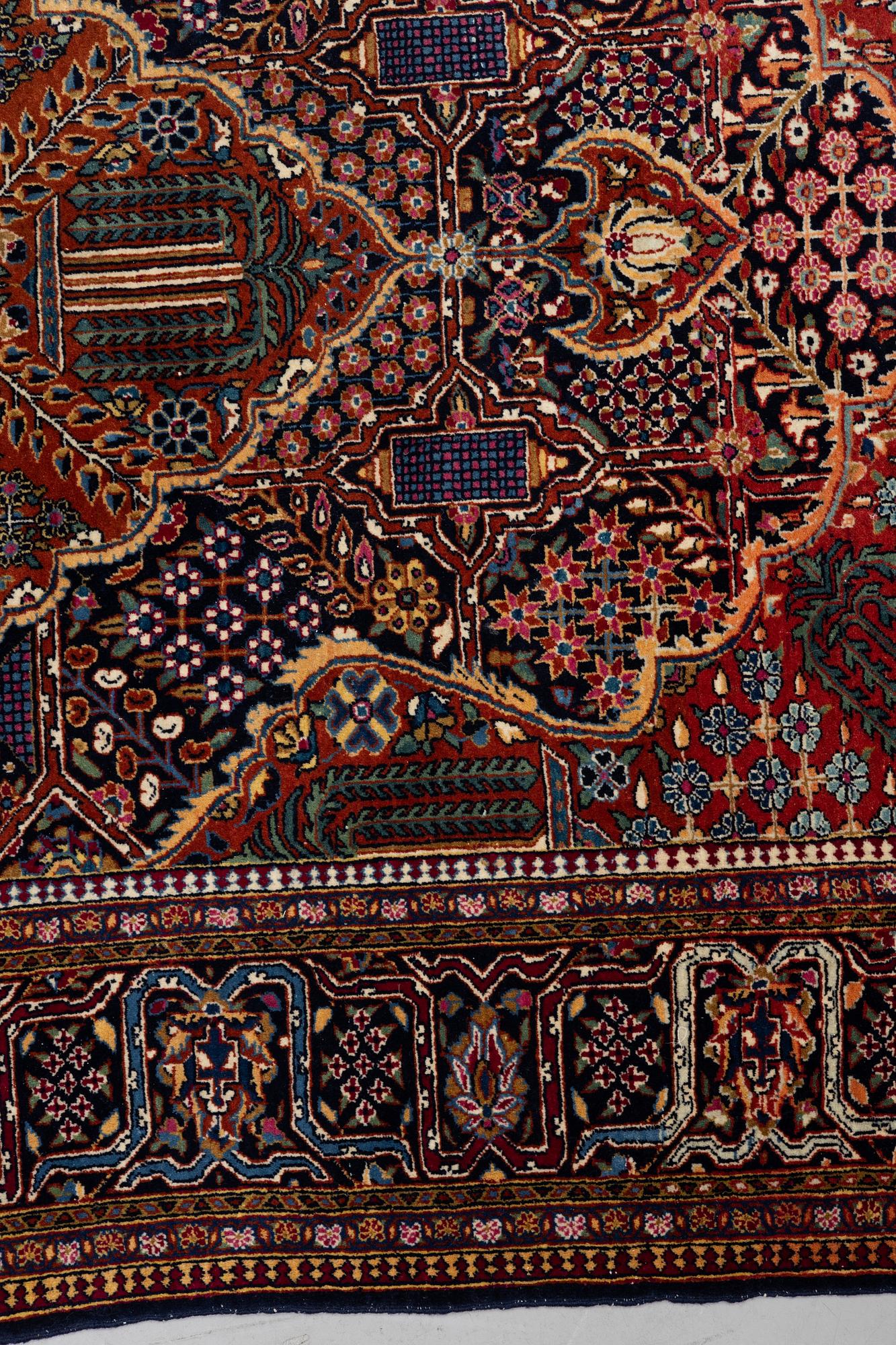 A rug, semi-antique Kashan, ca 216,5 x 140 cm.