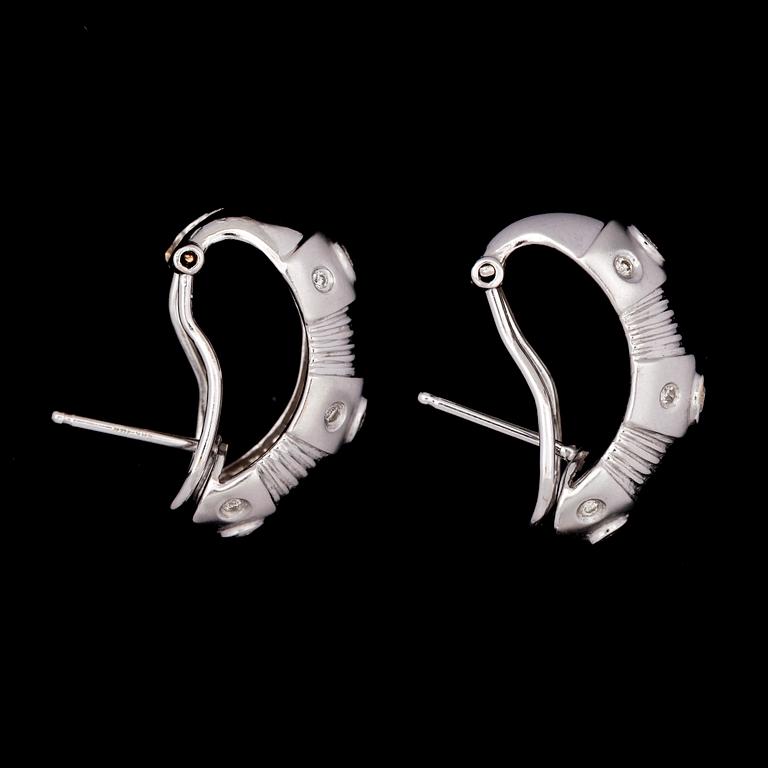 A pair of diamond and white gold earrings, tot. app. 0.50 cts.