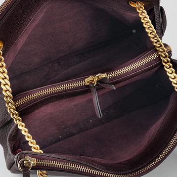 Mulberry, a burgundy leather handbag.