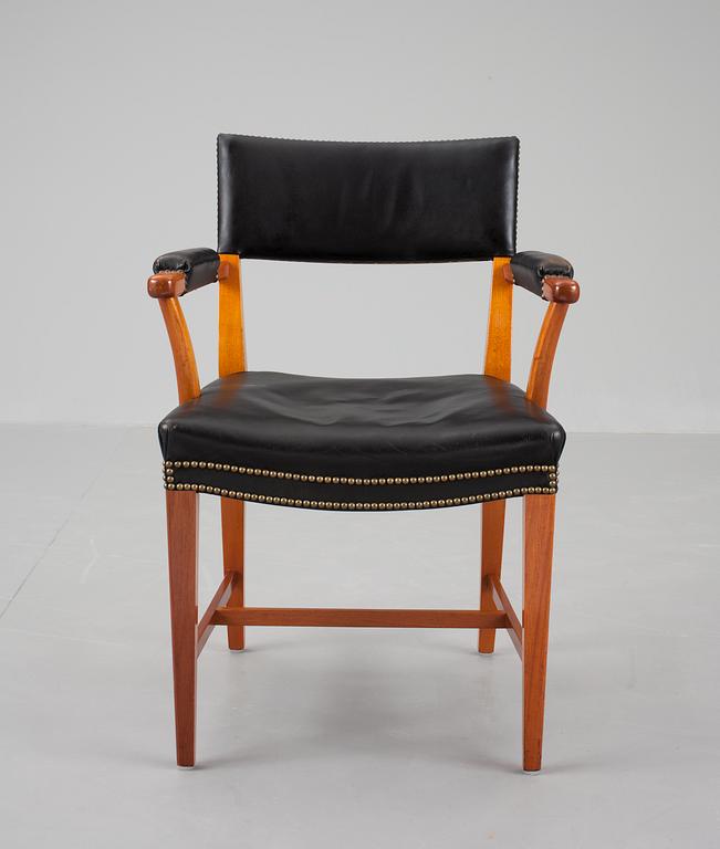 A Josef Frank mahogany and black leather armchair, Svenskt Tenn, model 695.