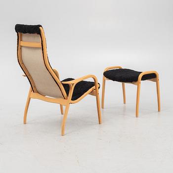 Yngve Ekström, a 'Lamino' easy chair with a foot stool, Swedese.