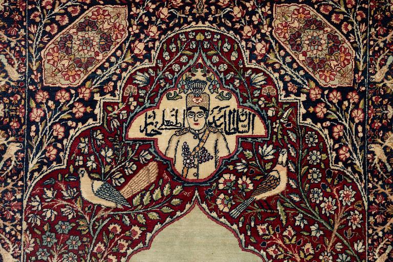 An antique Kirman Laver figural, Southeastern Iran, c. 220 x 135 cm.