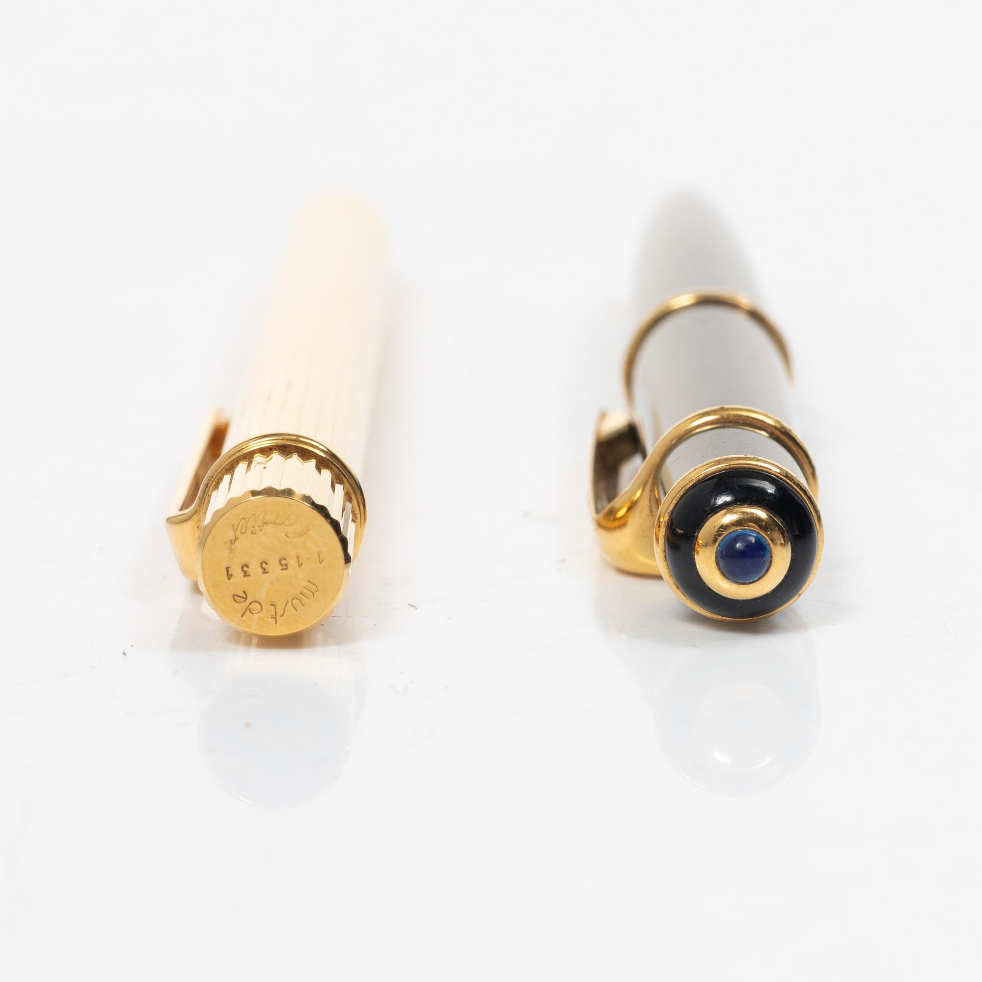 Cartier, Two ballpoint pens, 'must de Cartier' and 'Diabolo de Cartier'.