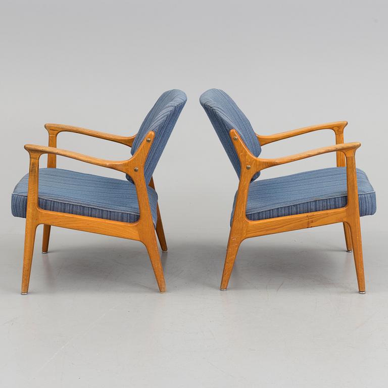 A pair of oak armchairs from Bröderna Andersson, mid 20th Century.