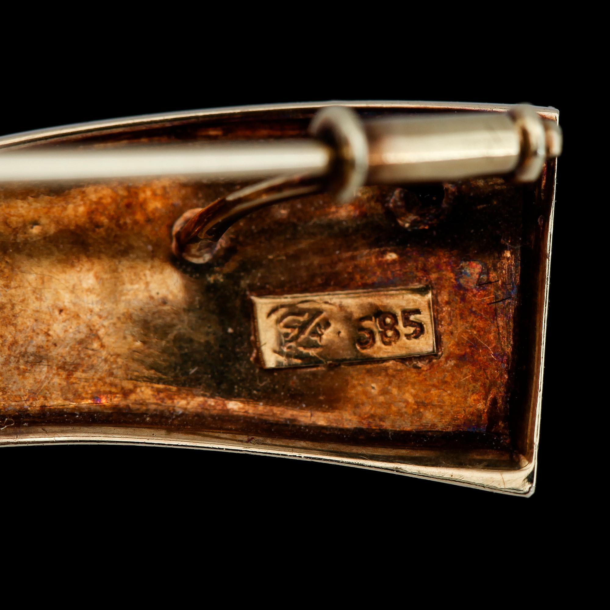 BROSCH, 14K guld. Total vikt ca 9 g.