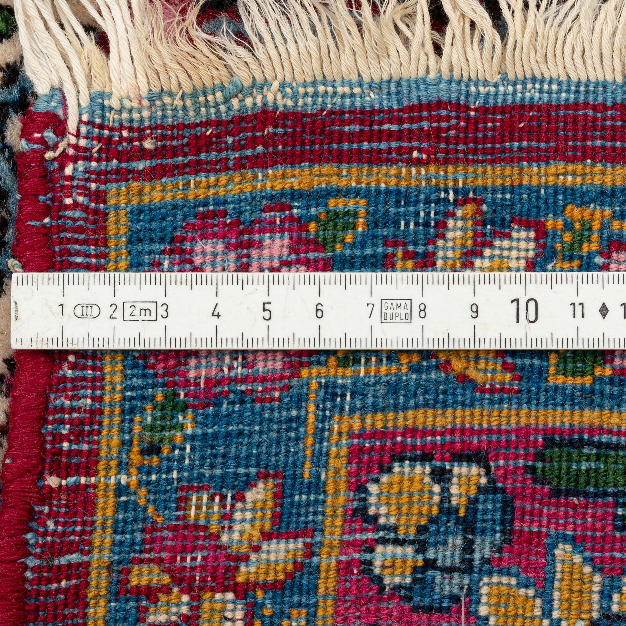 A semi-antique Kerman carpet, ca  402 x 291 cm.