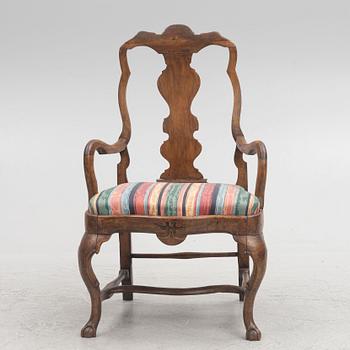 A roccoco armchair, 18th century.