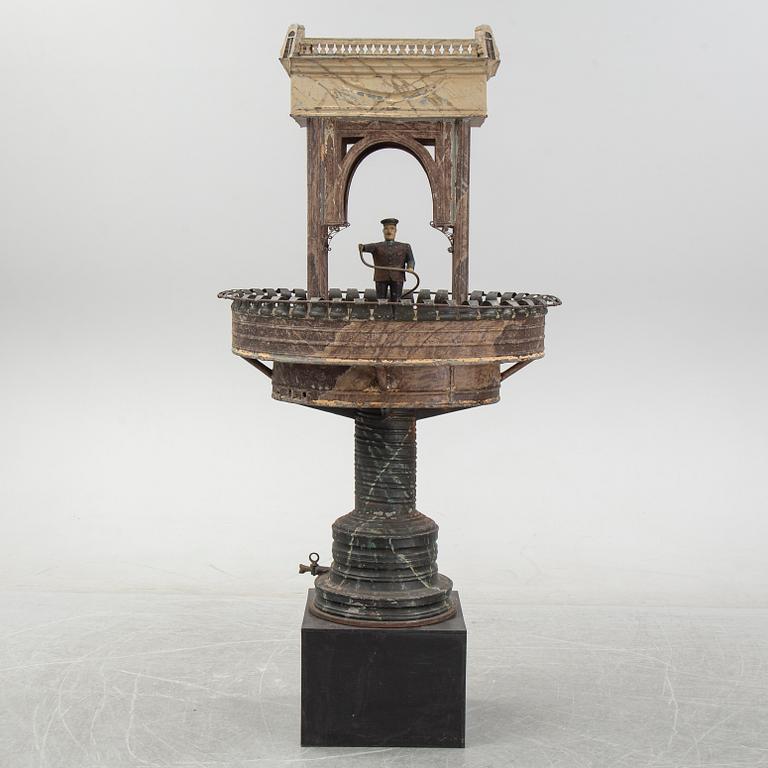 A painted and richly decorated plate garden fountain, late 19th century.