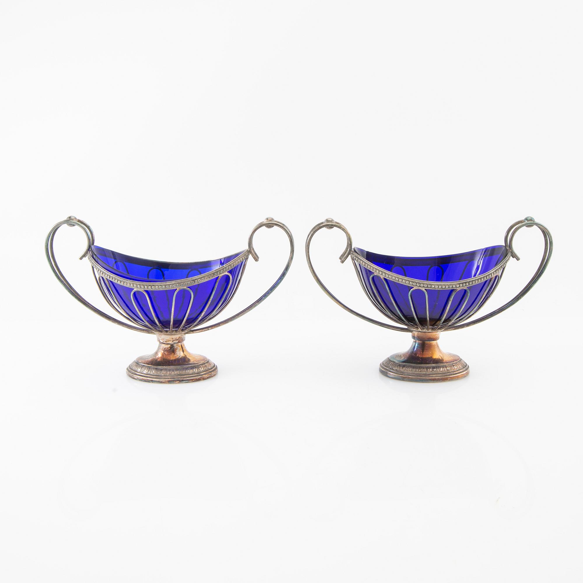 Sugar bowls 2 pairs and a cream jug, silver plate and glass, first half of the 20th century.